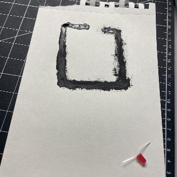 Painted page with leds that would be used to sense if the surface is conductive.